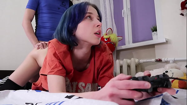 Fucks a teen while she plays the console -real orgasm