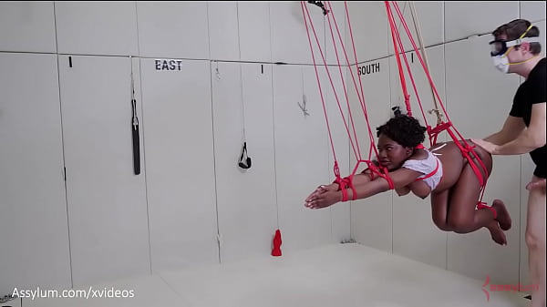 Beautiful black submissive gets gagged, tied up, ass punished, and turned into an anal compass to help her dominant conquer space - Noemie Bilas