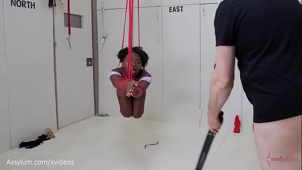 Beautiful black submissive gets gagged, tied up, ass punished, and turned into an anal compass to help her dominant conquer space - Noemie Bilas