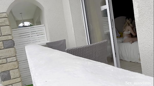 Hot spanish girl was secretly filmed in her hotel room through the window while she was taking some nude photes.