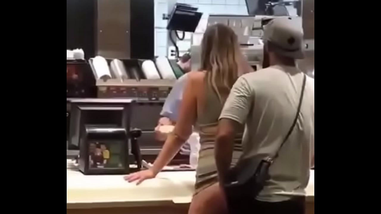 White couple having sex in restaurant