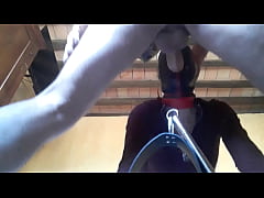  - Tied to a machine, masked and hooded, she has to suck a big cock
