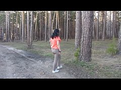  - A milf with big tits and a juicy PAWG undresses in the forest and masturbates her pussy with a spruce branch. Merging with the nature of a mature nudist. Outdoor amateur fetish.
