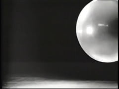  - Vintage babe on stage with props doing strip routine