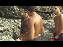  - Two Big Hard Dicked Dudes Mouth Fucking A Tanned Twink On The Beach!