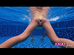  - Asian Girl Swims with Big Butt Plug