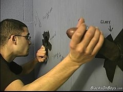  - White guy sucking off black cocks at gloryhole