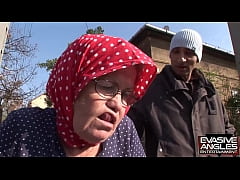  - EVASIVE ANGLES This babushka&comma; stockings and glasses wearing grannie&comma; is getting her massive old knockers sucked by her interracial caregiver