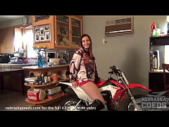  - model from iowa with huge tits getting naked on a motorcycle in her parents living room
