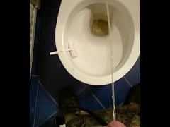  - Guy pissing in toilet