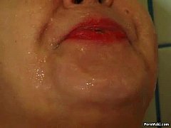  - Chubby granny pissing in the shower