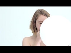  - Young looner babe blowing and popping her first balloon