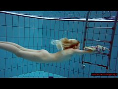  - Blonde in a dress in a pool