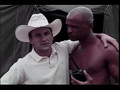  - Playful white dude Paul Morgan is lookng for next salami smuggler for his narrative and he finds black volunteer Winston Love in tented camp