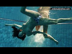  - Two sexy amateurs showing their bodies off under water