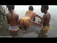  - Raw documentary footages with 3 African tribe girls dancing in the river in the forrest