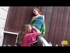  - Two beautiful lesbians enjoy kissing outside and moaning loudly from an intense orgasm