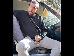  - Hippie having fun in the car out in public.